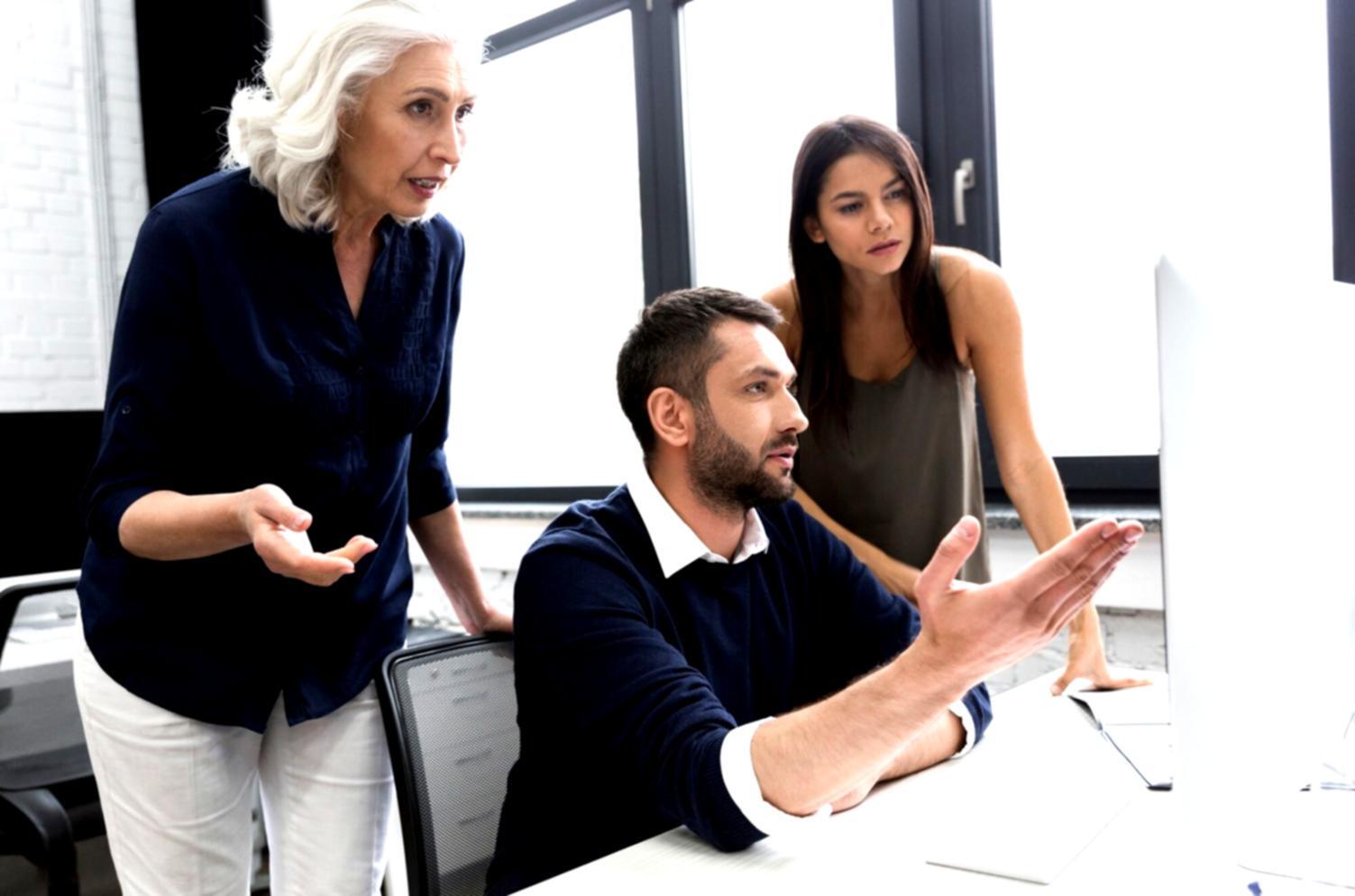 Team collaborating on budgeting strategies at corentivolix office workspace